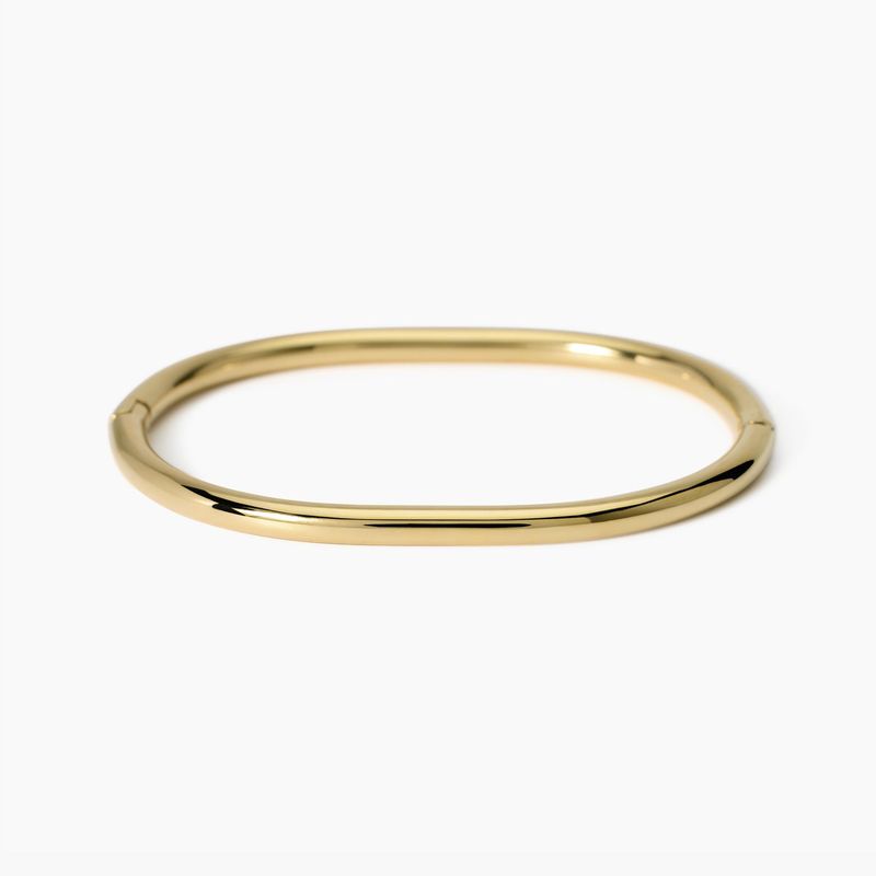 Bracciale rigido in acciaio dorato Kidult