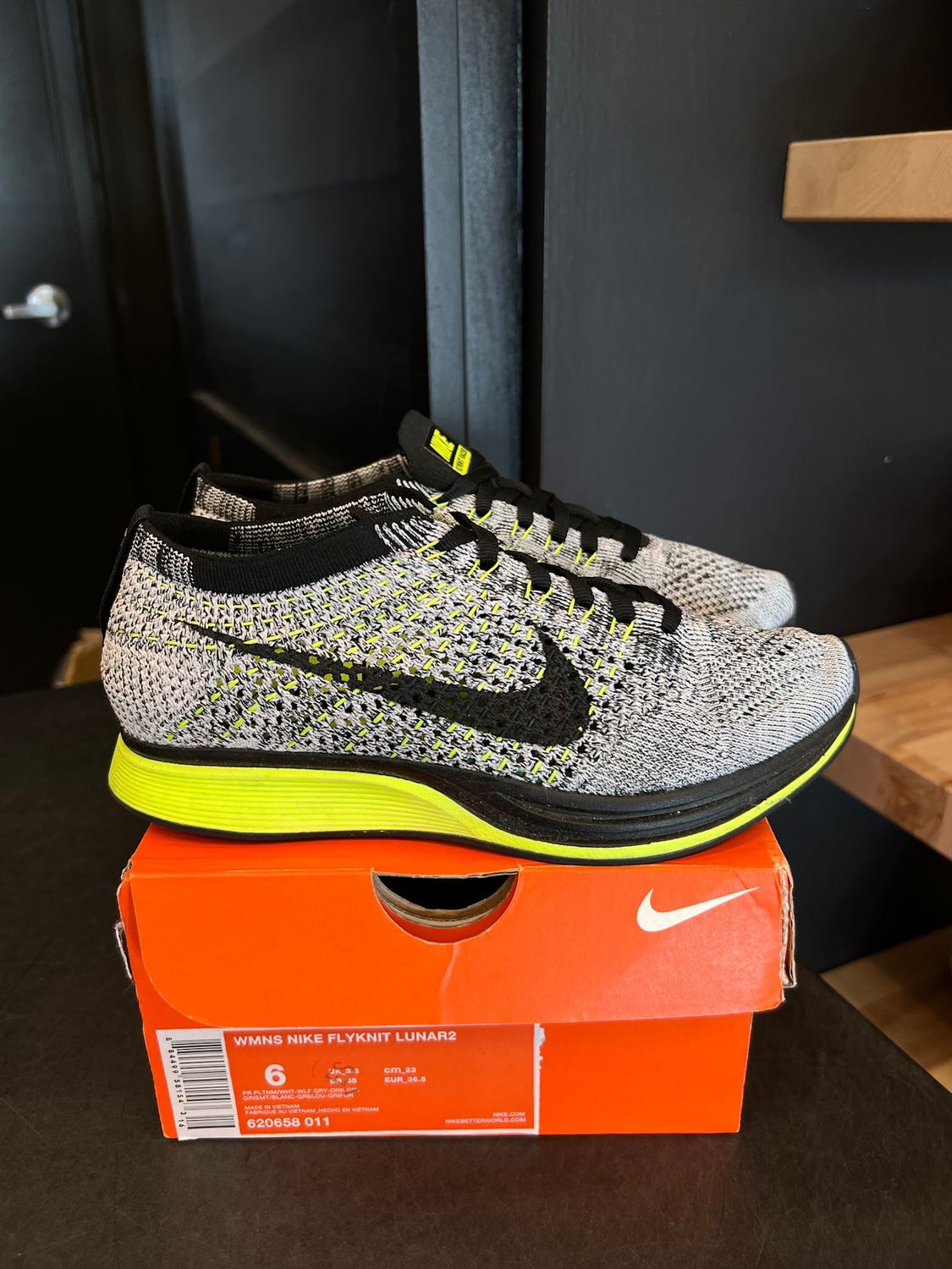 Nike Flyknit Racer Oreo Volt Size 4.5, PREOWNED