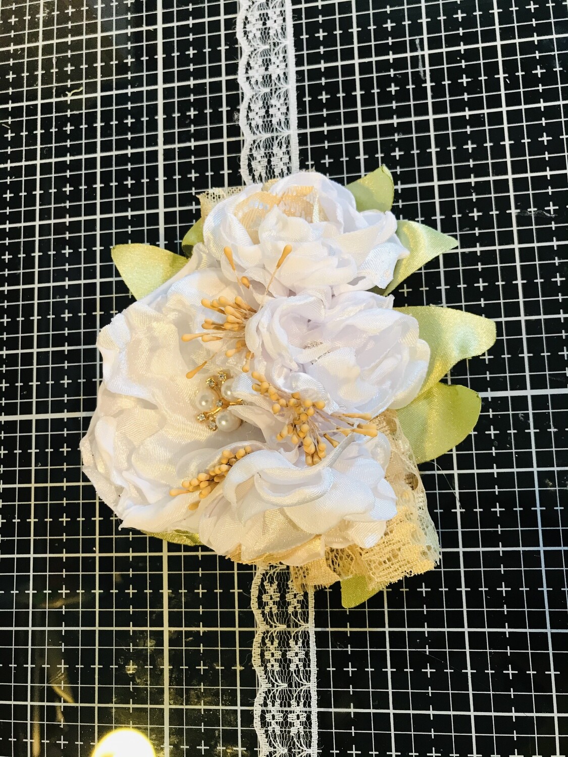 Corsage: white and gold