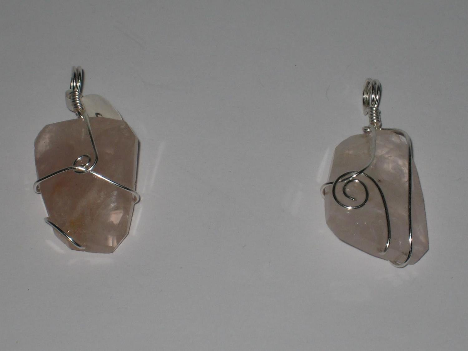Rose quartz faceted stone wrapped pendents