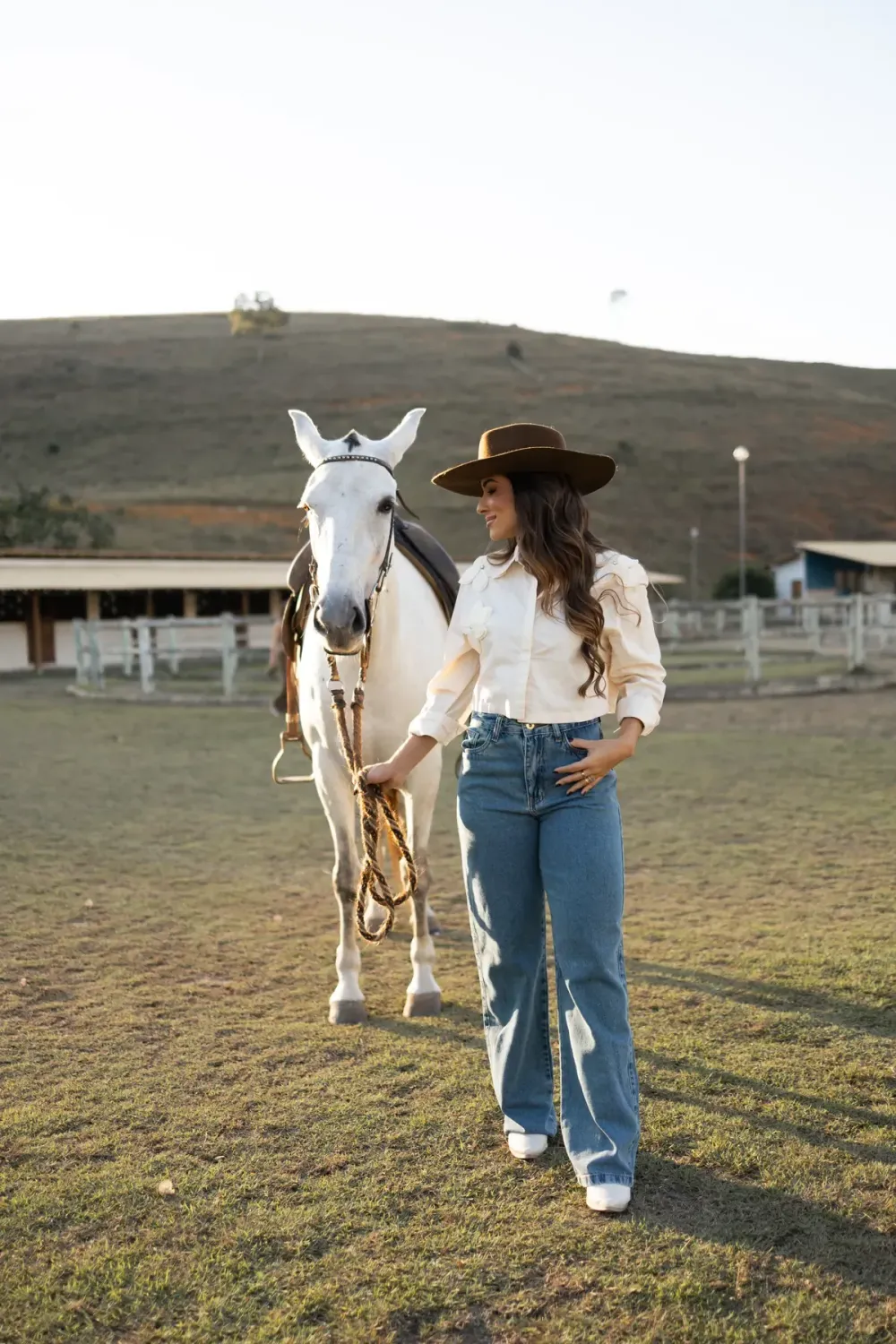 Woman wearing the Nexum Lumi Wide Leg Jean