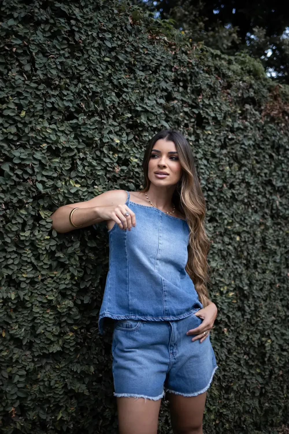 Woman wearing the Nexum Frayed Hem Denim Short