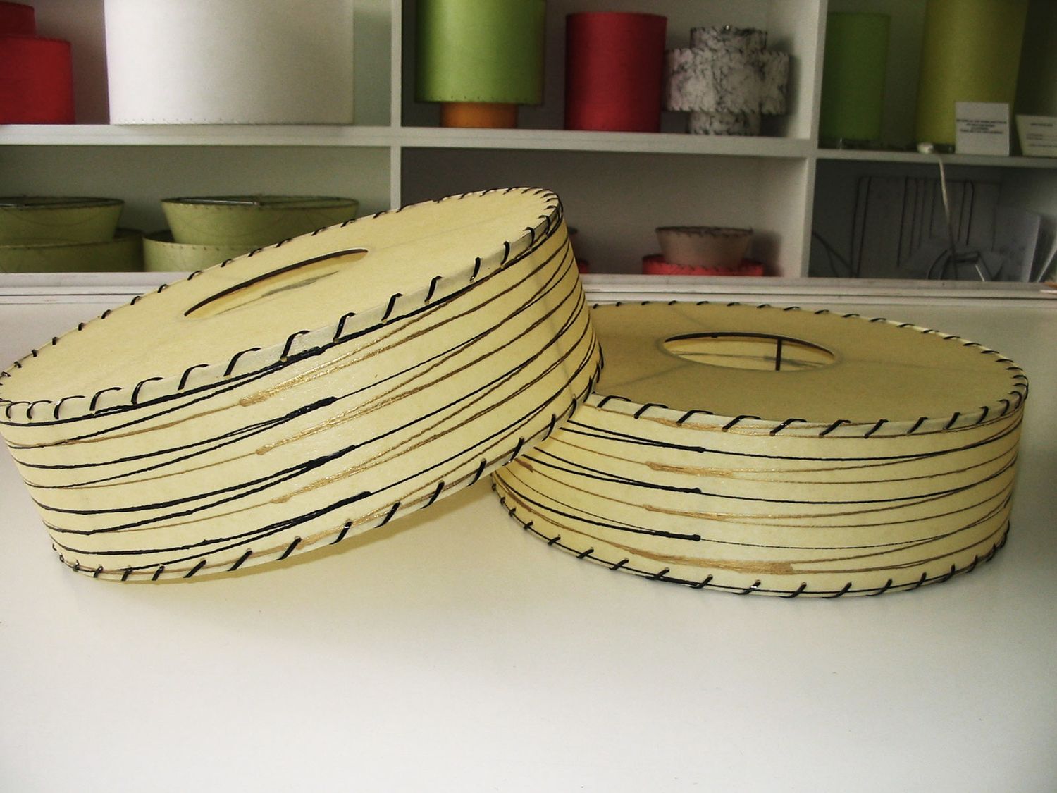 pair of Z-lamp tambourine lamphades in beeswax