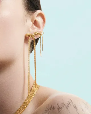 Textured stud earrings with statement bow Gold Plated W&amp;H
