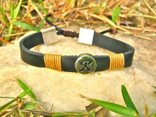 Indalo bracelet ~ leather wrapped cord strap
