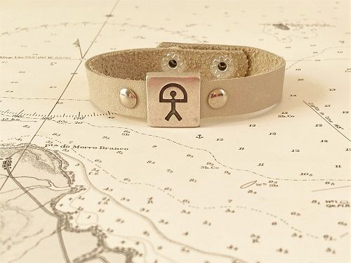 Indalo charm bracelet ~ natural leather strap, ecru