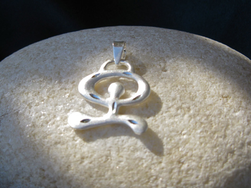 Indalo pendant ~ etched/reversible silver, dancing