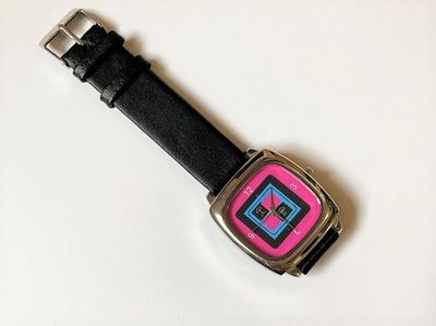 Watch with Indalo Man symbol for good luck