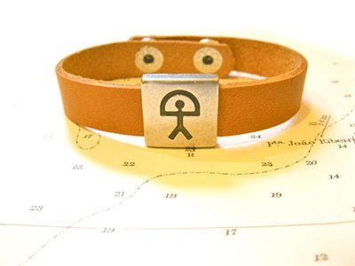 Indalo charm bracelet ~  leather strap, natural