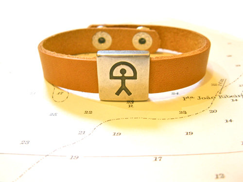 Indalo charm bracelet ~  leather strap, natural
