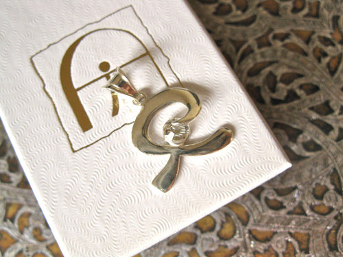 Indalo pendant ~  smooth, silver + zirconite