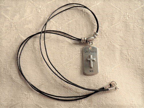 Christian cross dog tag for safekeeping