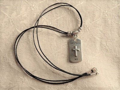 Christian cross dog tag for safekeeping