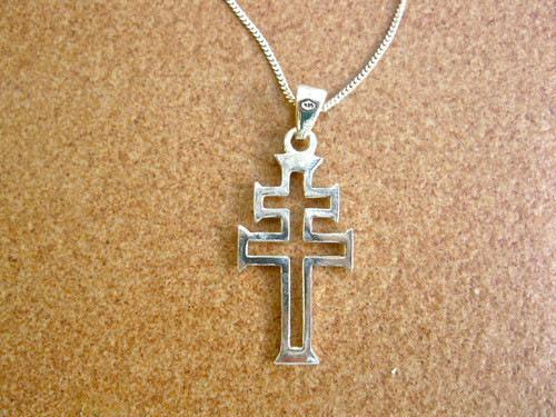 This modern style Caravaca cross is suitable for men or women