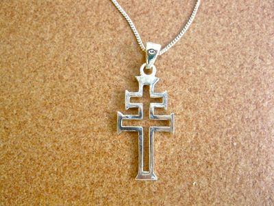 This modern style Caravaca cross is suitable for men or women