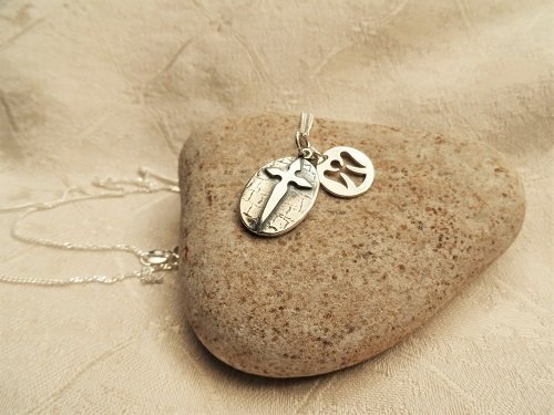 Santiago cross with Angel charm for safekeeping