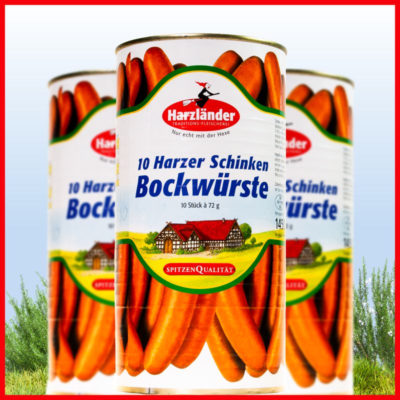 Harzländer Schinken-Bockwurst 10x72g Three Harzlander sausage cans on grass, labeled “10 Harzer Schinken Bockwurst.”
