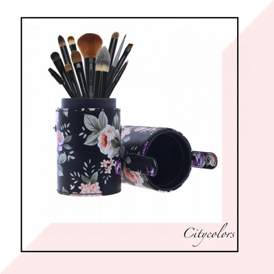 فراشي مكياج مجموعة مع علبة دائرية من الجلد.