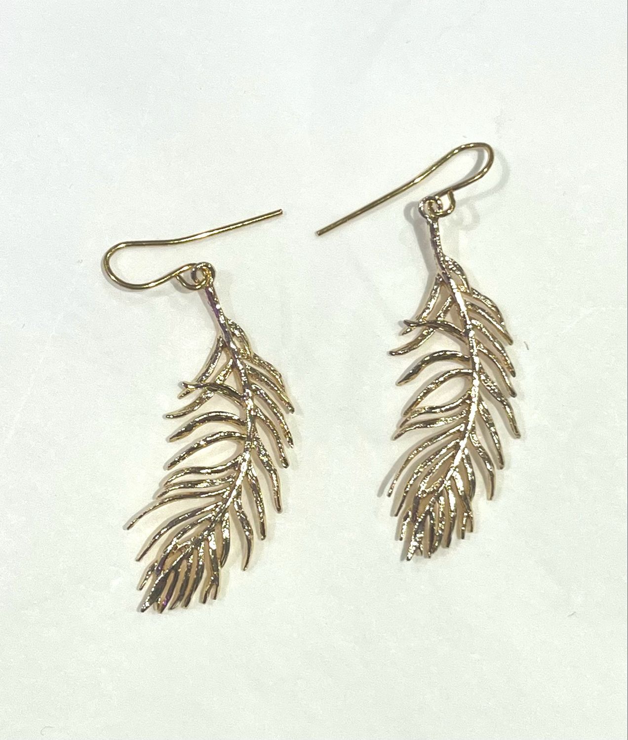 Boucles d’oreille plume or