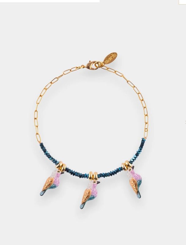 Bracelet en perles d’hématite et oiseaux porcelaine