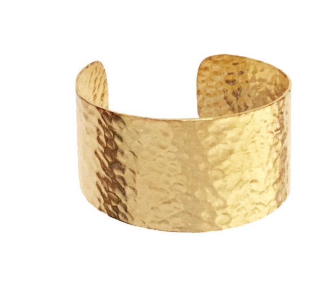 Manchette or martelé