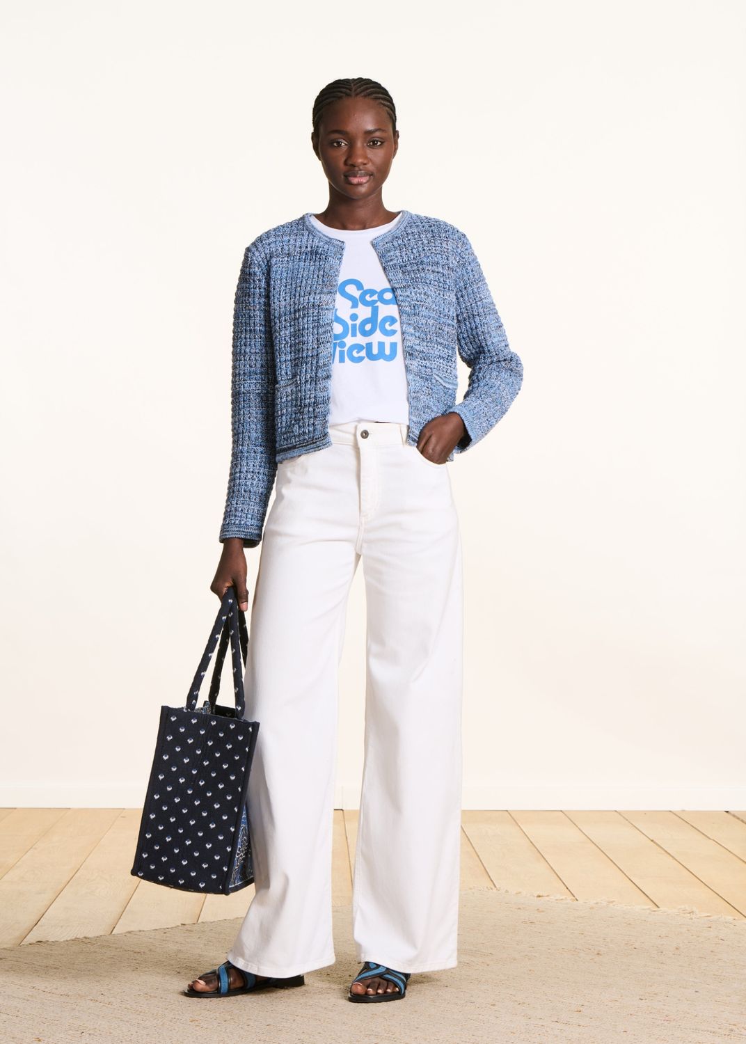 Gilet bleu ouvert en maille chinée