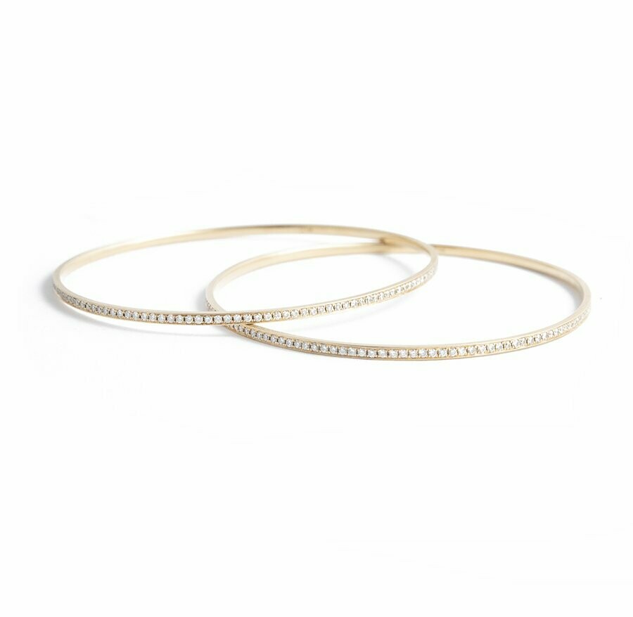 A Pair of 18kt Yellow Gold and Diamond Bangles