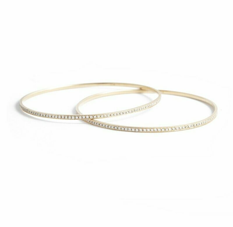 A Pair of 18kt Yellow Gold and Diamond Bangles