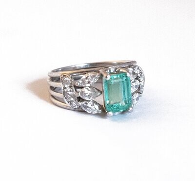 Custom Made Emerald Diamond and Platinum Ring.