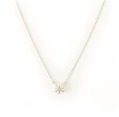 Tiffany Diamond Solitaire Pendant. .77 E, VS1.