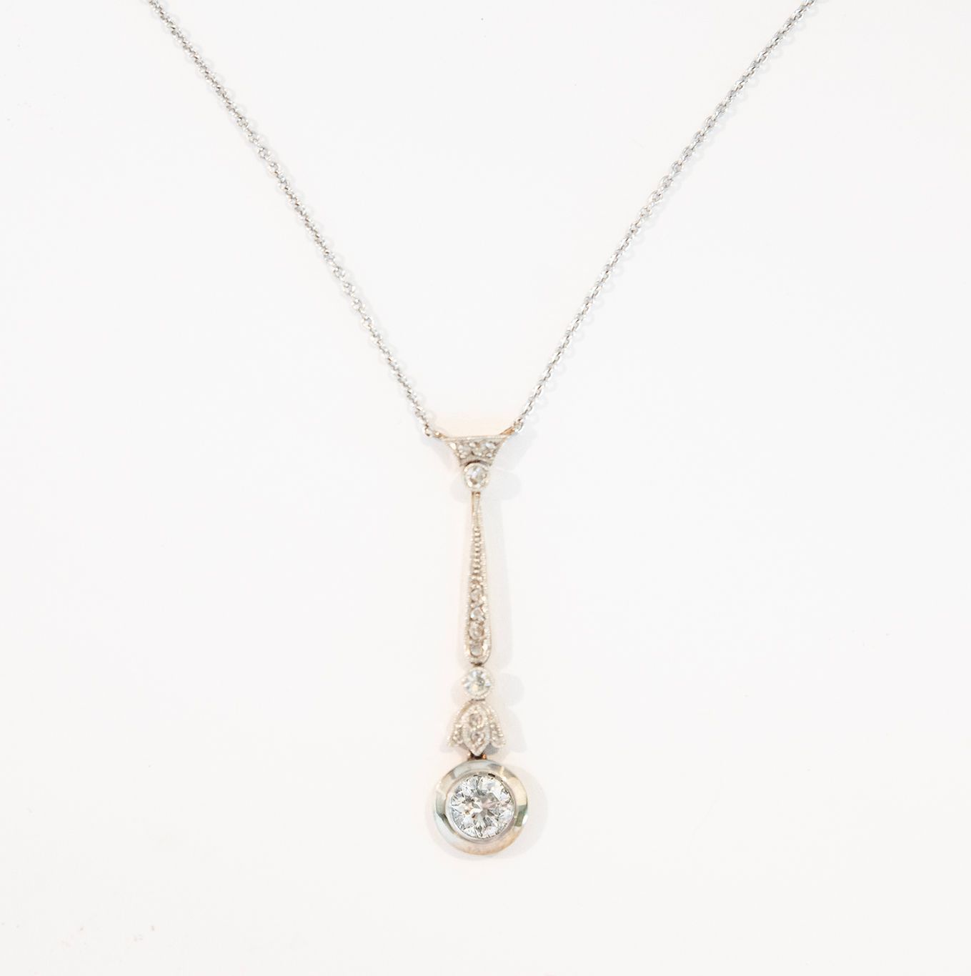 Art Deco Platinum and 18kt Yellow Gold Drop Necklace.