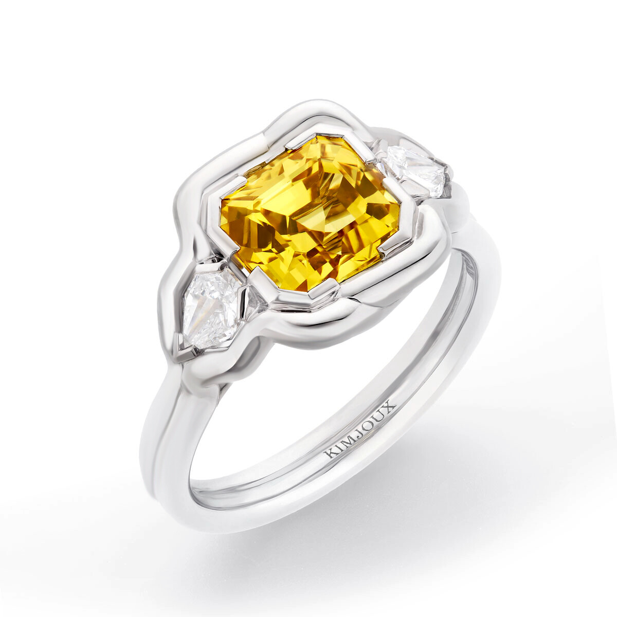 Bold Balance Sapphire Ring with Pearshape Side Diamonds