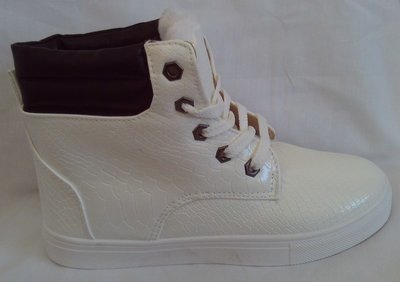 WHITE AND BLACK BOOT