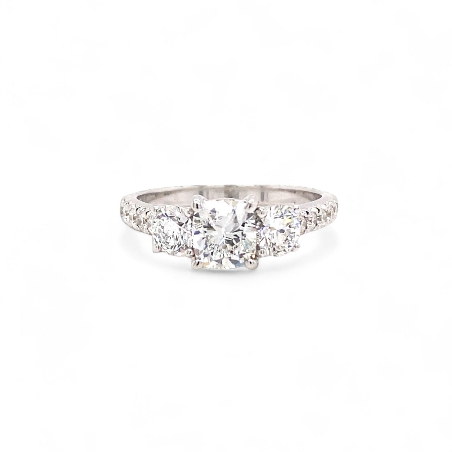 Classic three stone diamond engagement ring