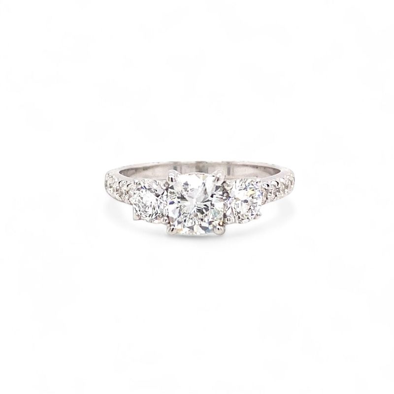 Classic three stone diamond engagement ring