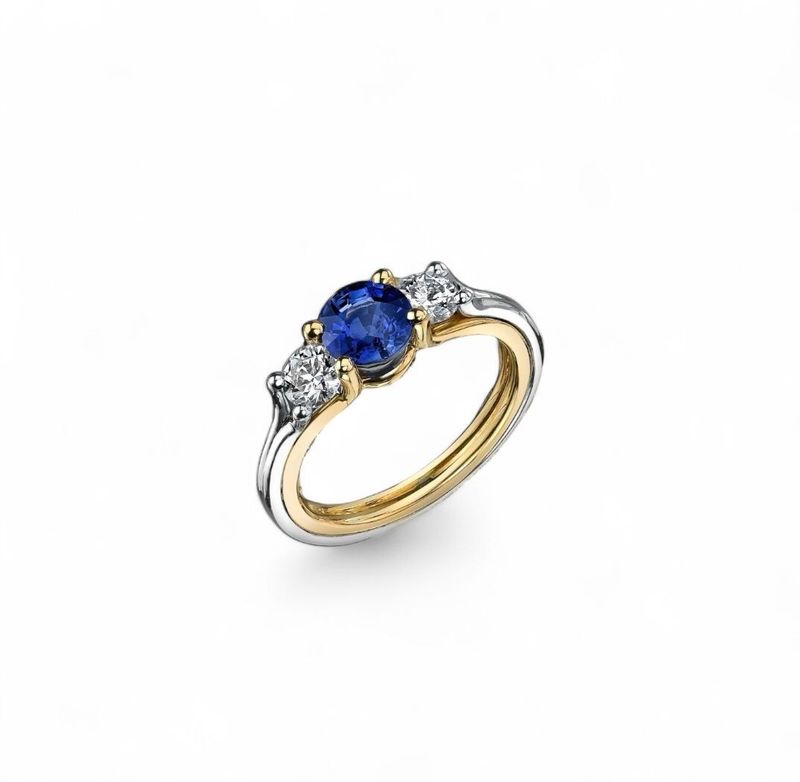 Classic Three Stone Engagement Ring With Sapphire and Diamonds