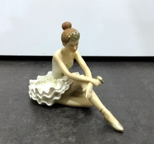 Ballerina Seduta