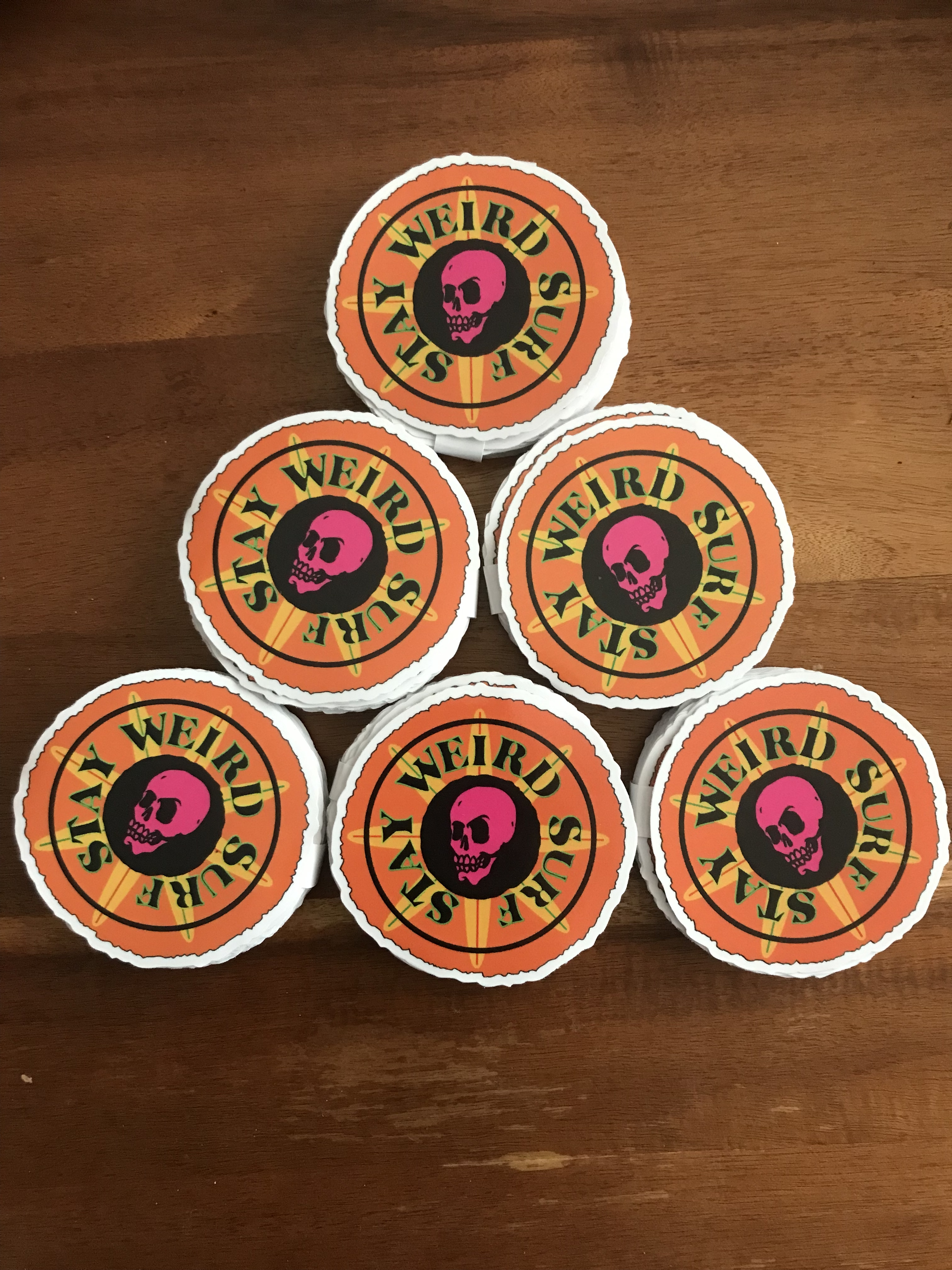 Skull and Boards 
Stay Weird Surf Die Cut Sticker