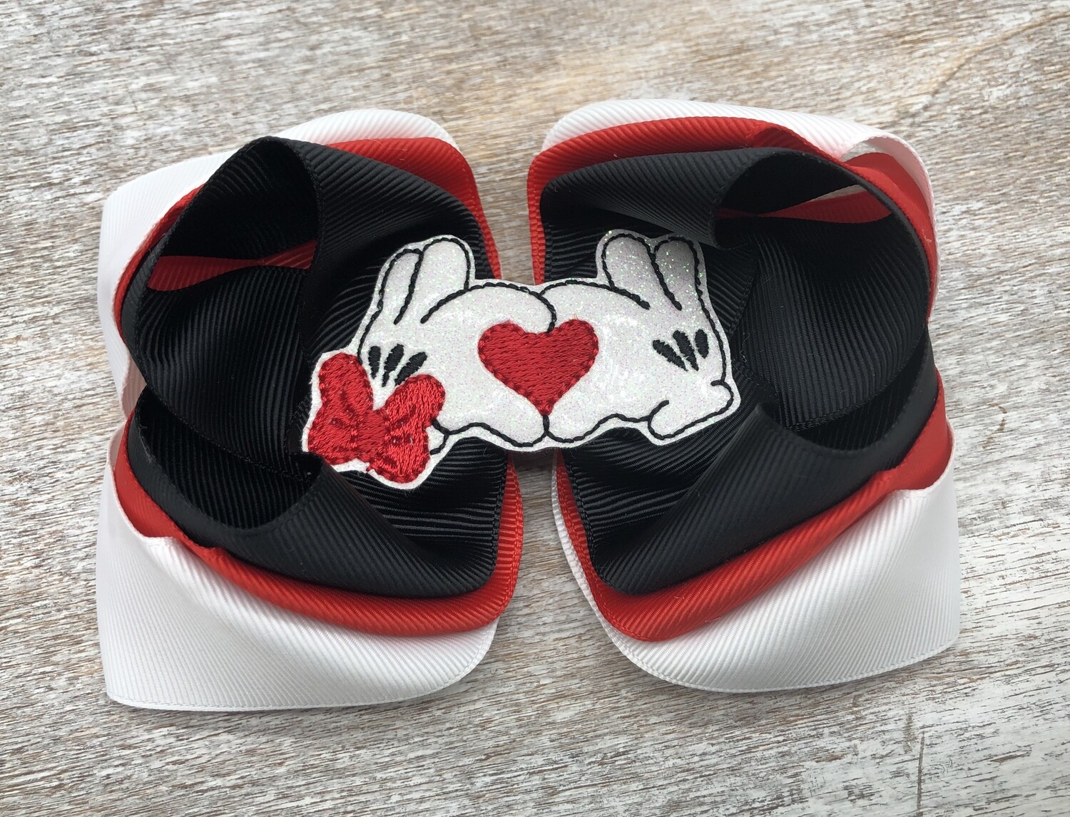 Minnie and Mickey hands hairbow