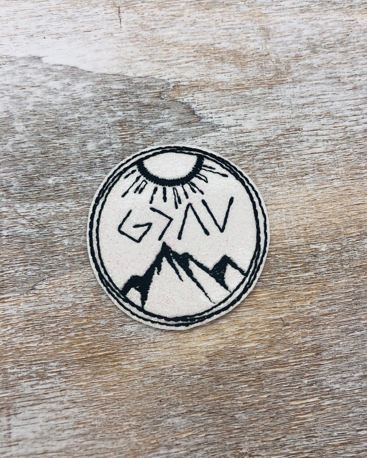 God is greater mountains Feltie