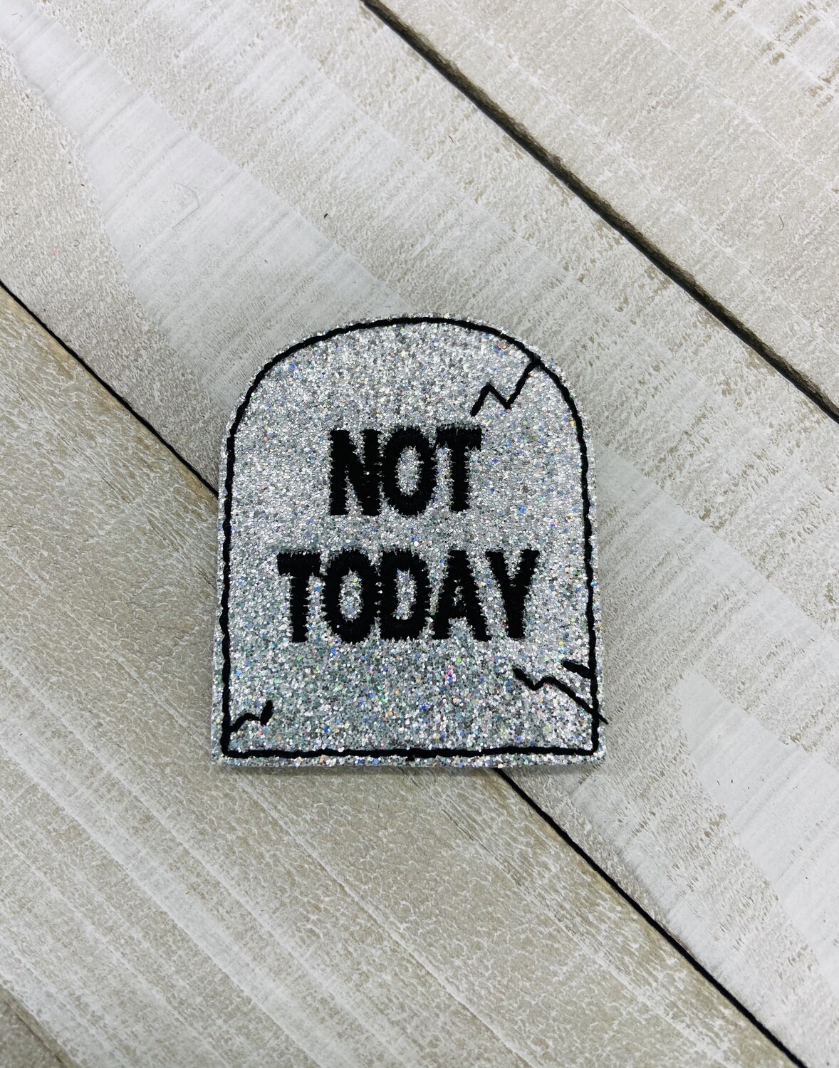 Tombstone feltie
