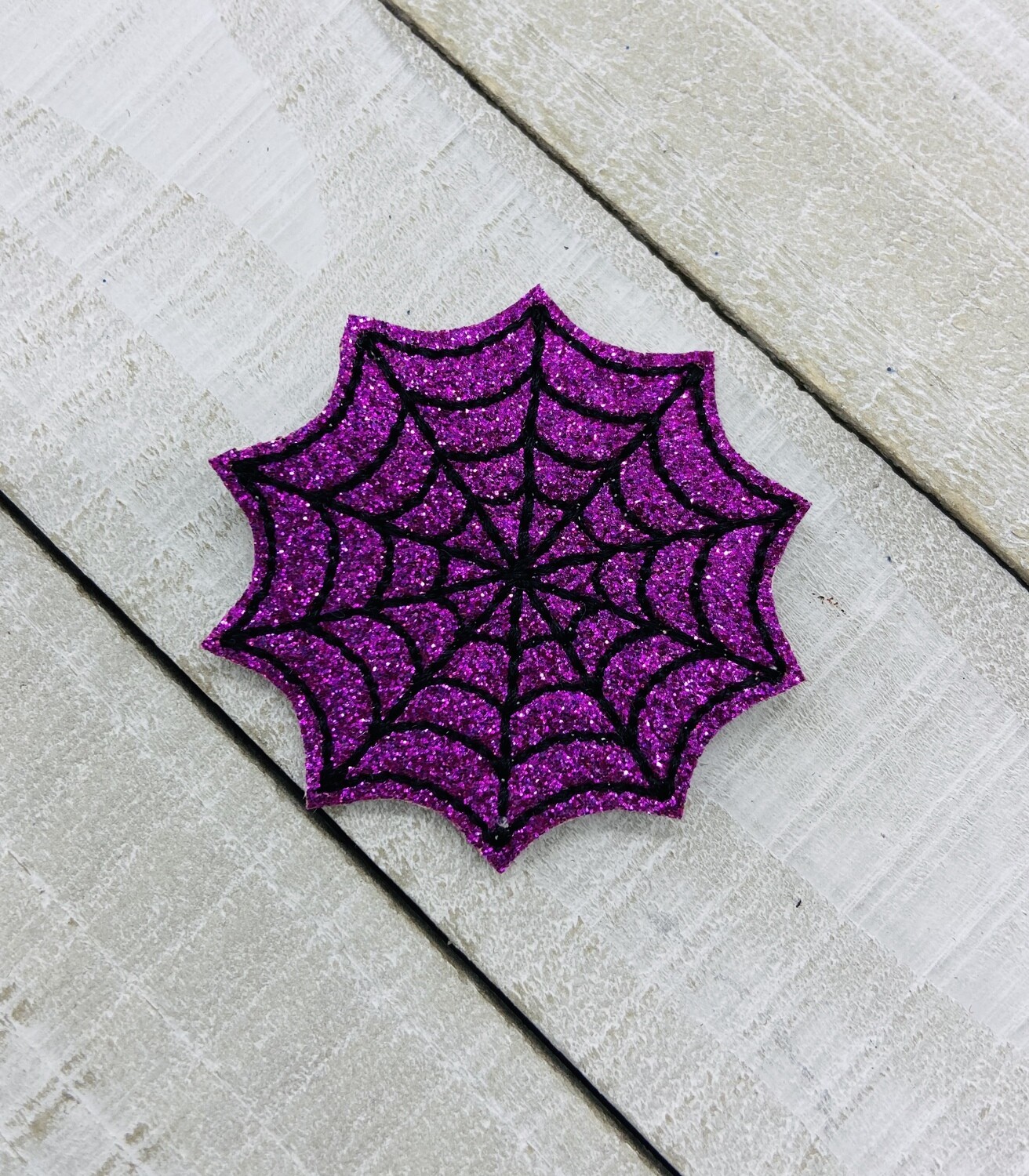 Spider web feltie