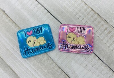 Tiny humans Feltie