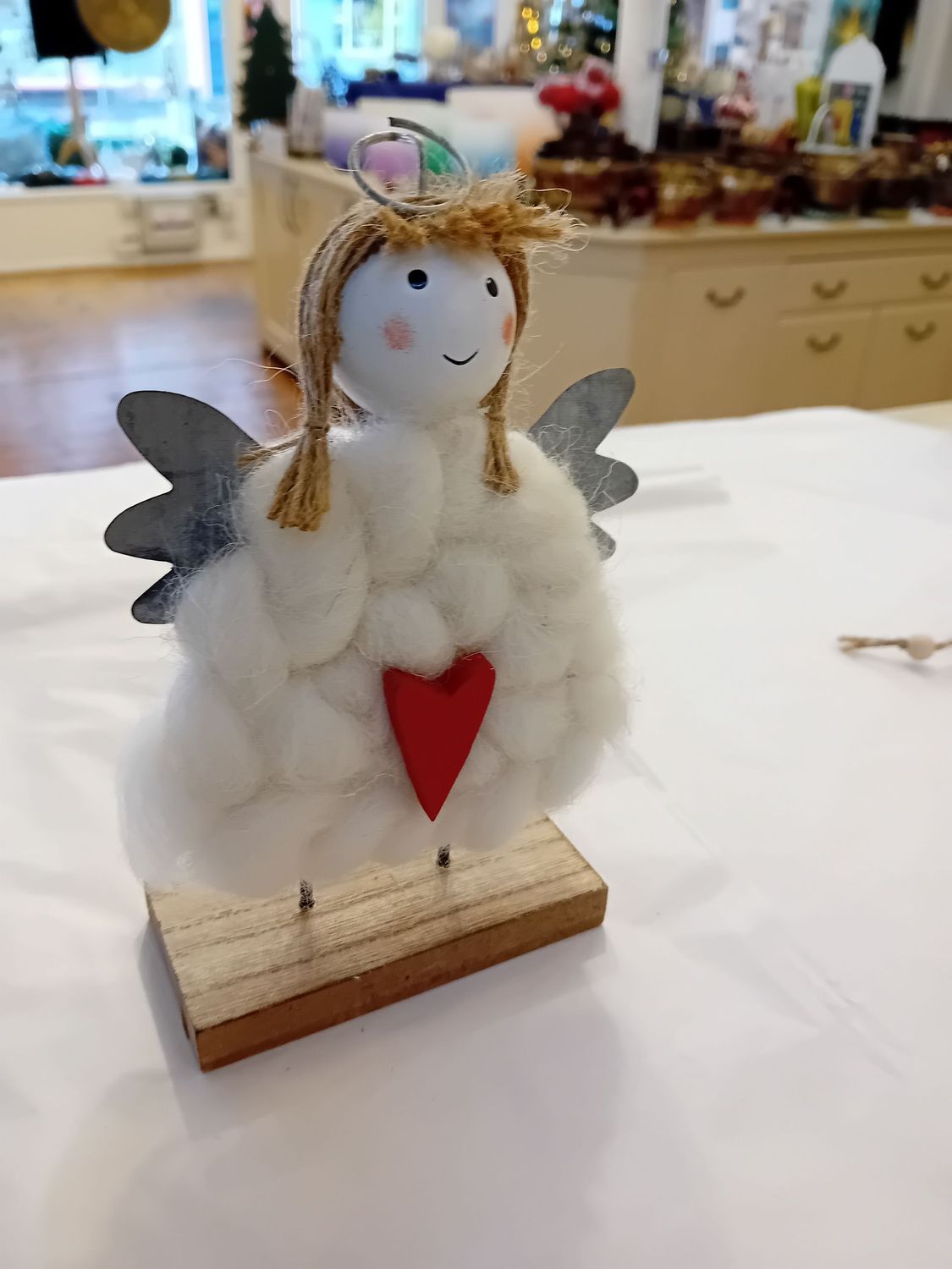 Standing angel with heart