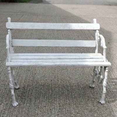 Lot 5,   A Victorian Coalbrookdale style cast iron white painted garden bench, 103cm 80/120