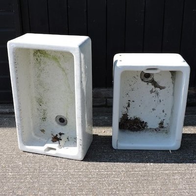 Lot 25,   A ceramic butler's sink, 77 x 43cm, together with another butler's sink 30/50