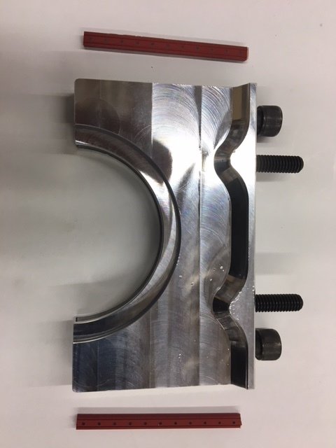 Billet rear main seal retainer kit.