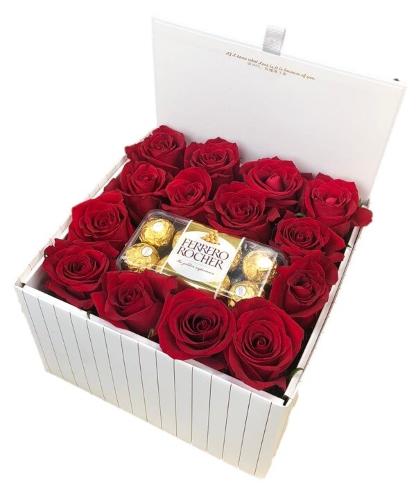 Large white box of roses with chocolate