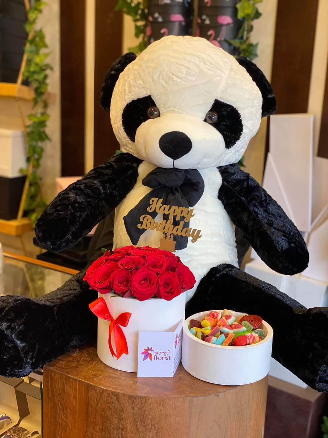 Red Roses in black box with candy and teddy