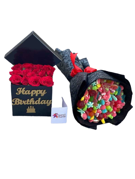 Red Roses in black with bouquet of candy